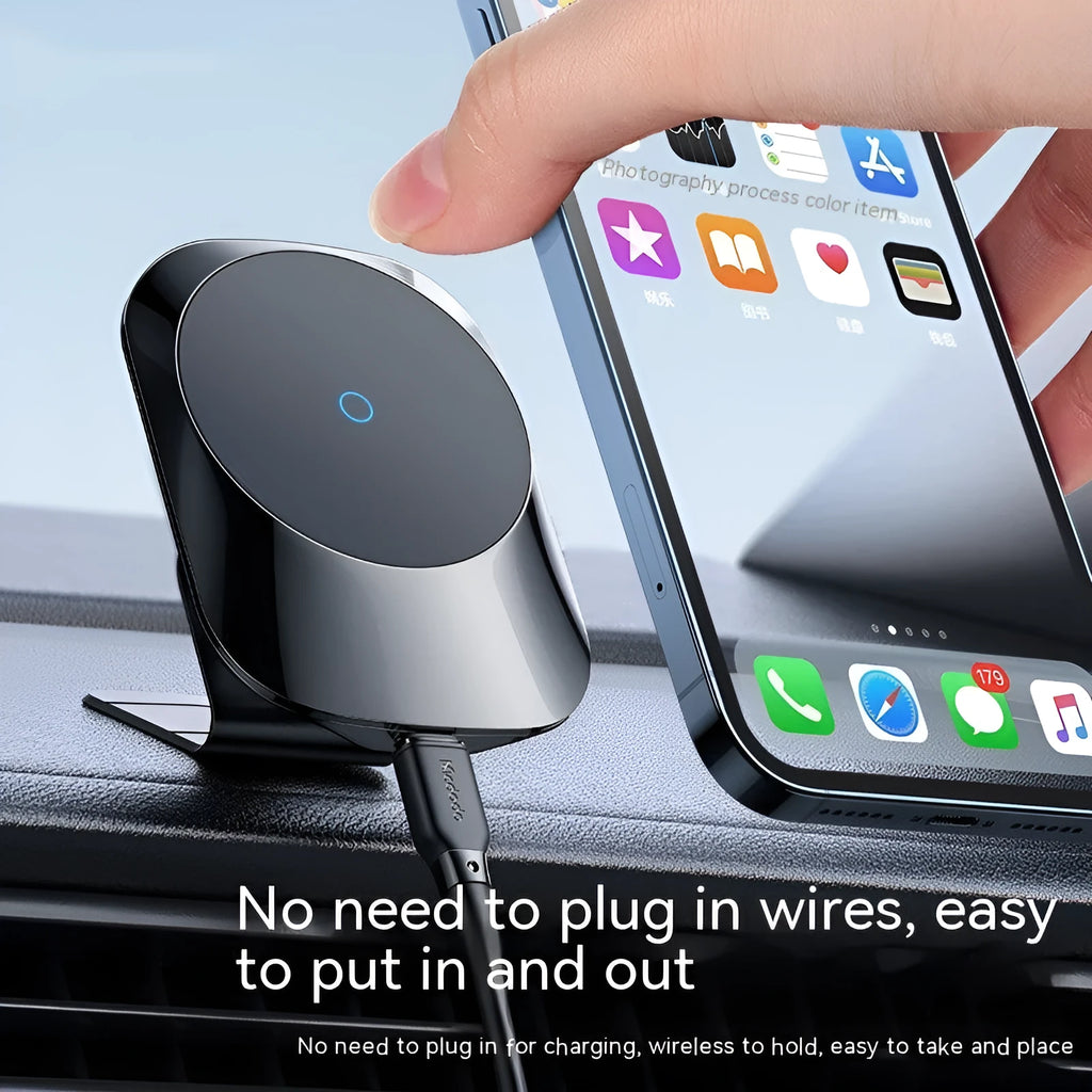 Black magnetic car wireless charger mounted on vehicle air vent with smartphone attached