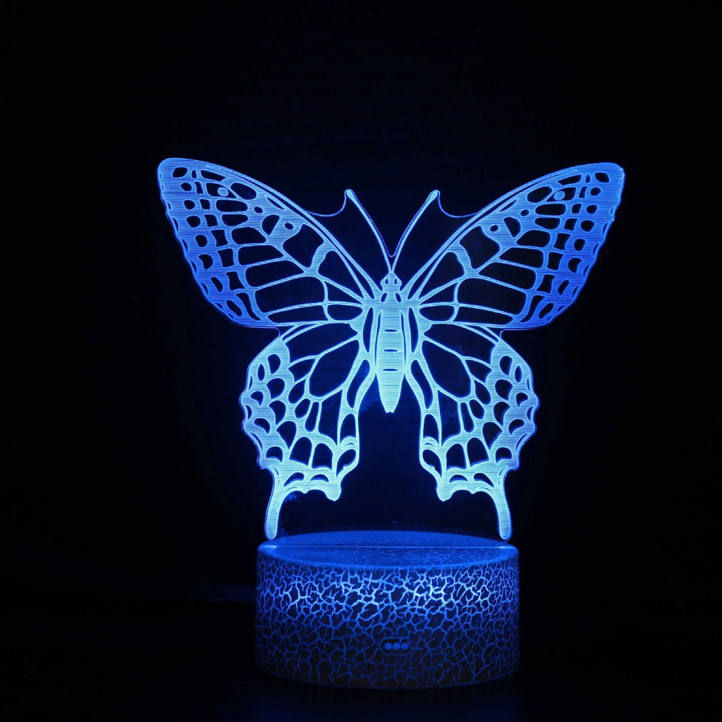 Colourful 3D acrylic USB table lamp with touch control on a wooden desk.