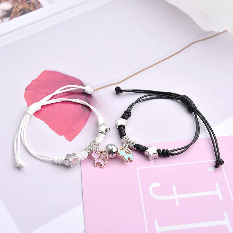Magnetic couple bracelets with crown and diamond designs in alloy electroplated construction