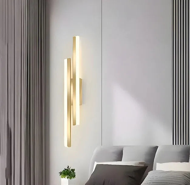 Gold modern double line wall lamp with a length of 500mm mounted on a wall.