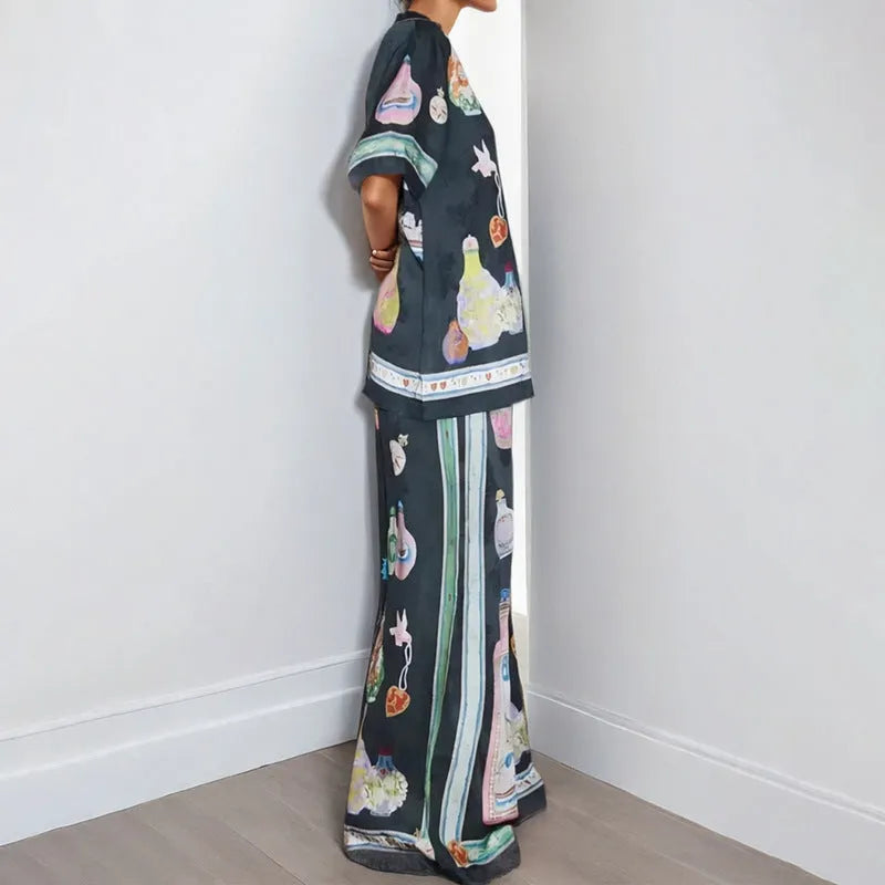 Black women's cartoon print casual set with cardigan and matching trousers