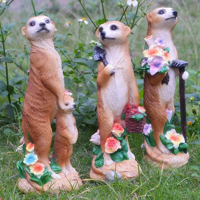 Straw hat mongoose garden ornament crafted from synthetic resin in three colour variations