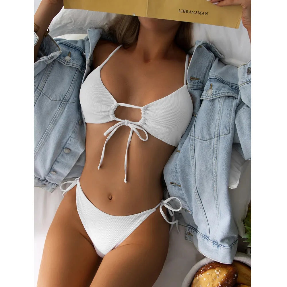 Women's solid colour drawstring bikini swimsuit in quick-dry fabric on a mannequin.