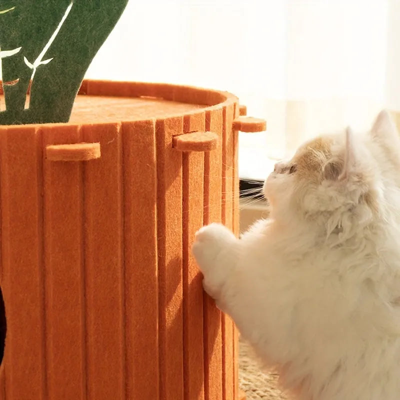 Orange carrot-shaped cat tunnel bed made of felt, showing its semi-enclosed design and entrance.