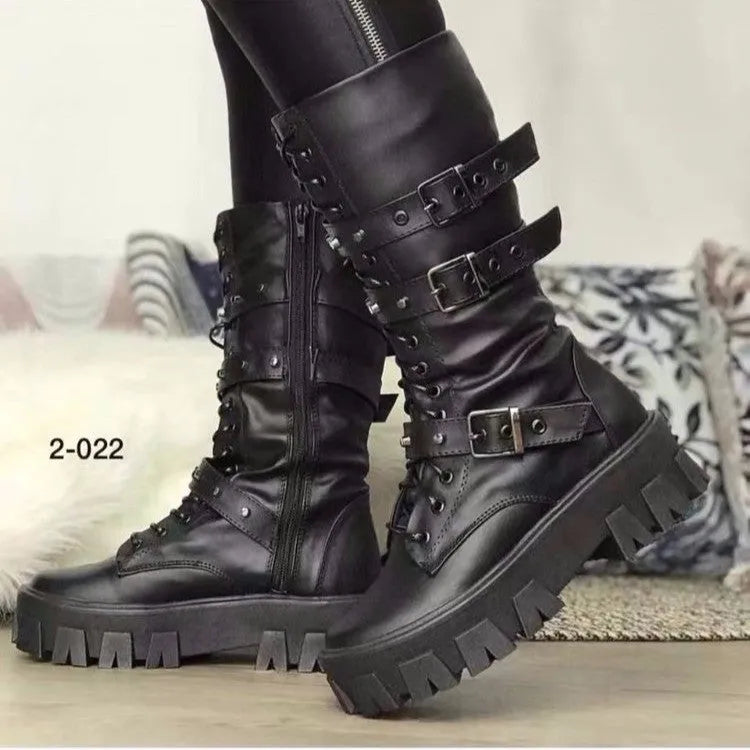 Women's black mid-calf knight boots with side zipper and metal belt buckle on artificial PU upper.