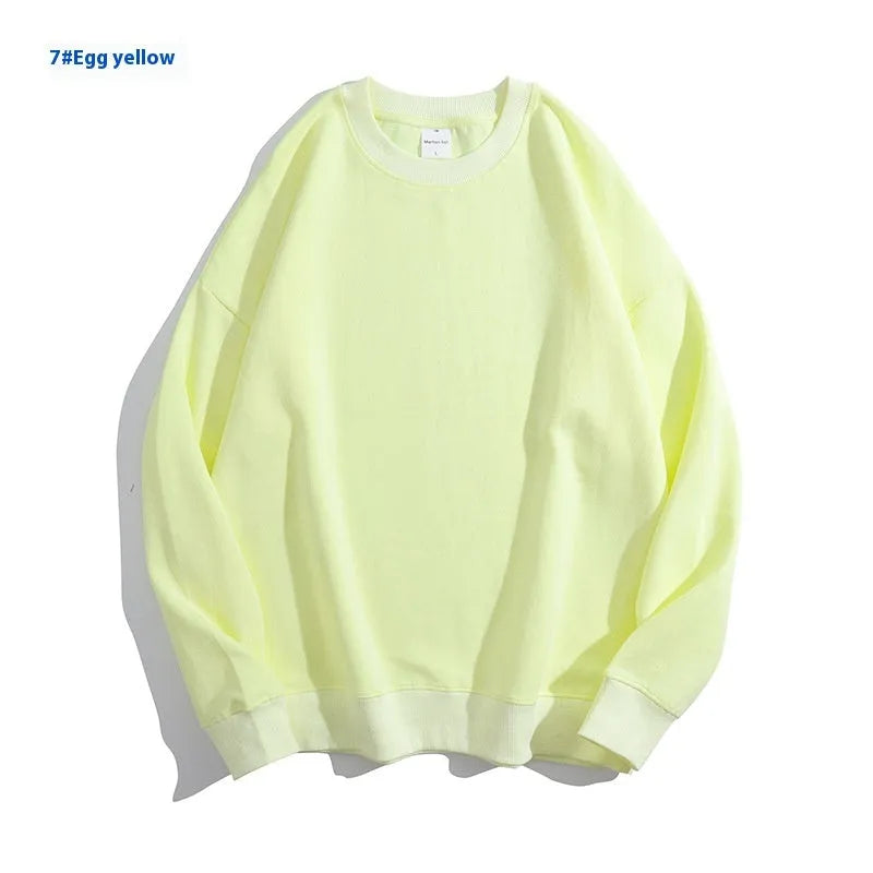 Women's loose fit cotton off shoulder sweater in a solid colour on a hanger.
