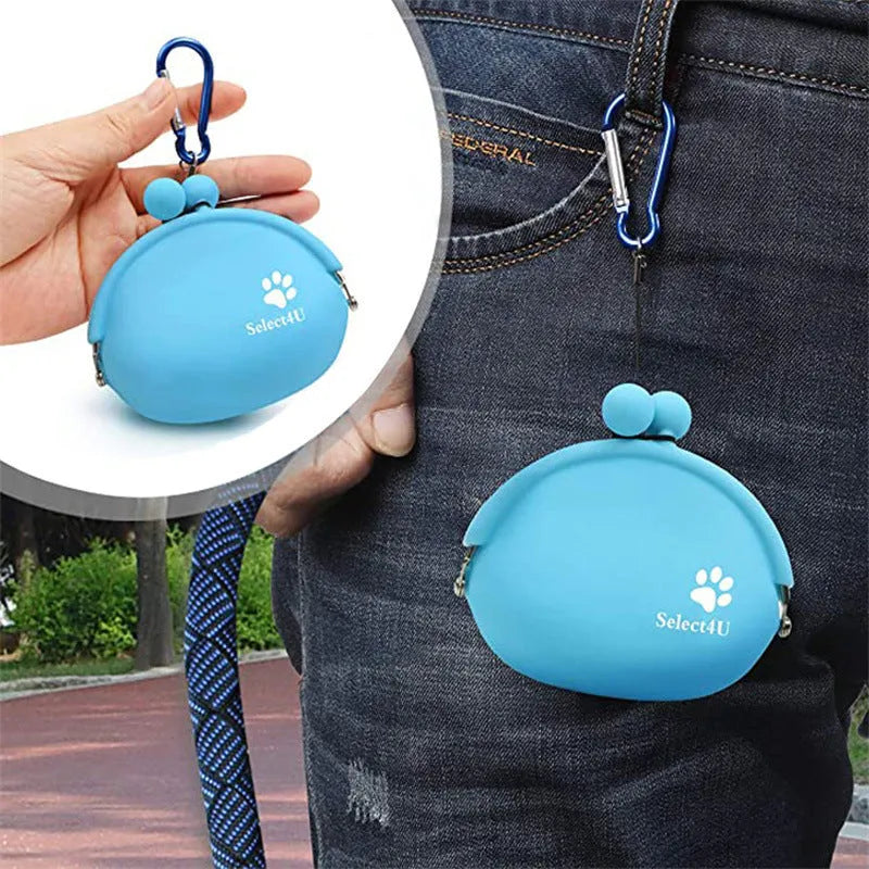 Yellow silicone pouch with hook-and-loop closure for dog treats, shown on a waistband.
