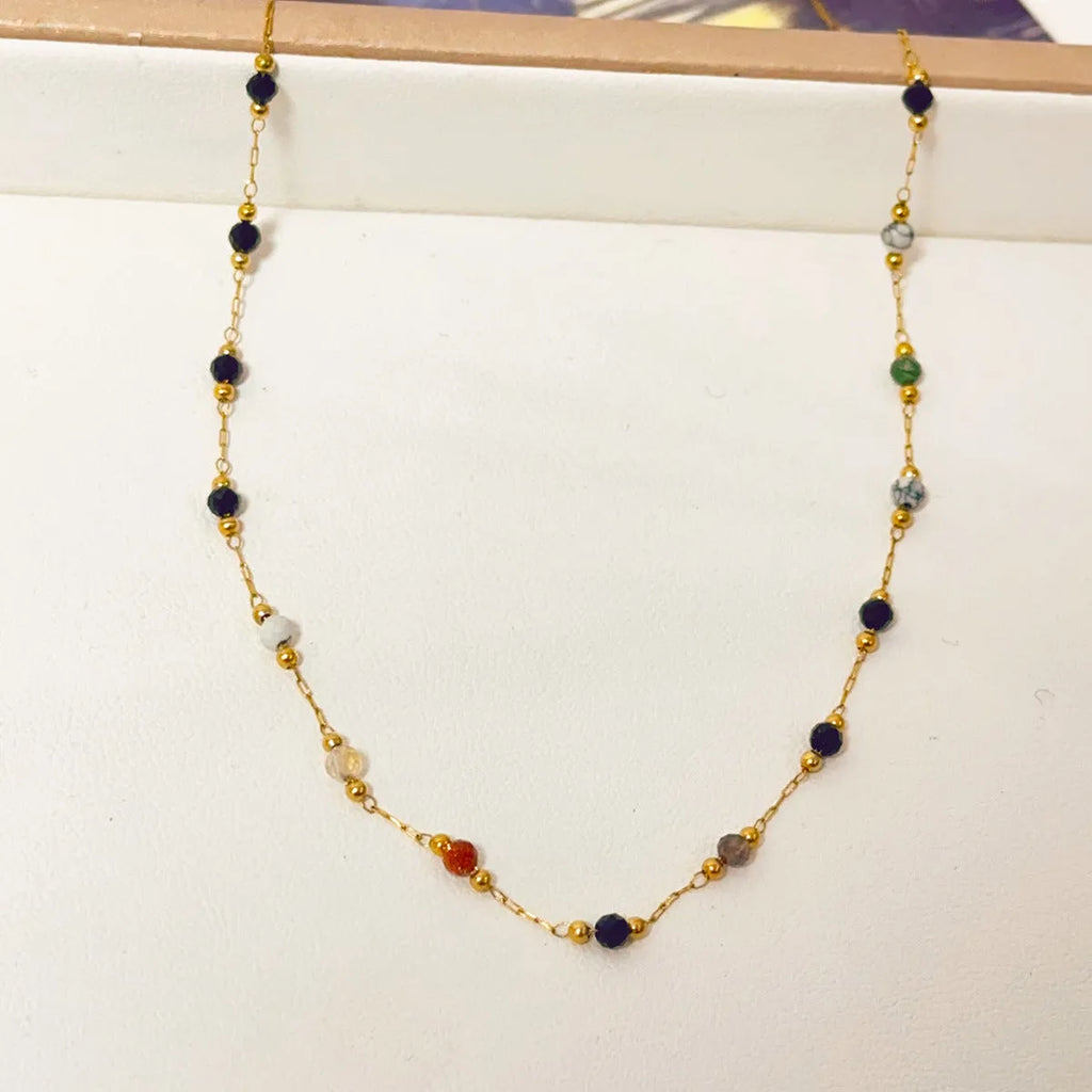 Women's titanium steel necklace with natural stone pendant and gold electroplated chain