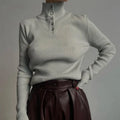 Retro breasted half turtleneck women's pullover sweater in slim fit with single-breasted placket closure