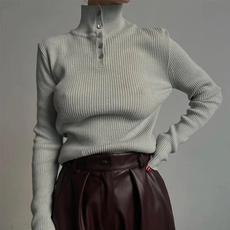 Retro breasted half turtleneck women's pullover sweater in slim fit with single-breasted placket closure