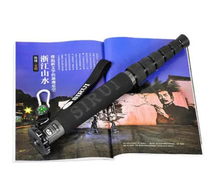 Black carbon fibre telescopic monopod for SLR cameras with six sections extended