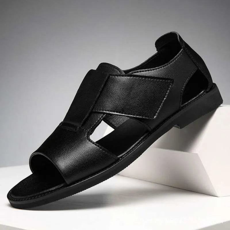 Men's black leather Roman sandals with an open toe and rubber sole on a white background.