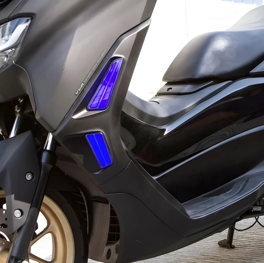Pair of LED steering turn signal lights for Yamaha NMAX155 scooter in blue and yellow colour.
