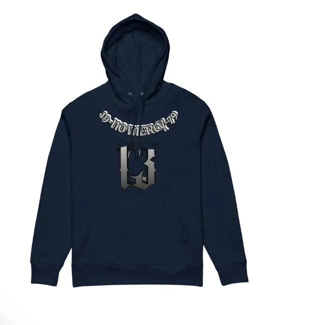 A beige fleece-lined hooded sweater on a hanger, showing its loose pullover fit and front pouch pocket.