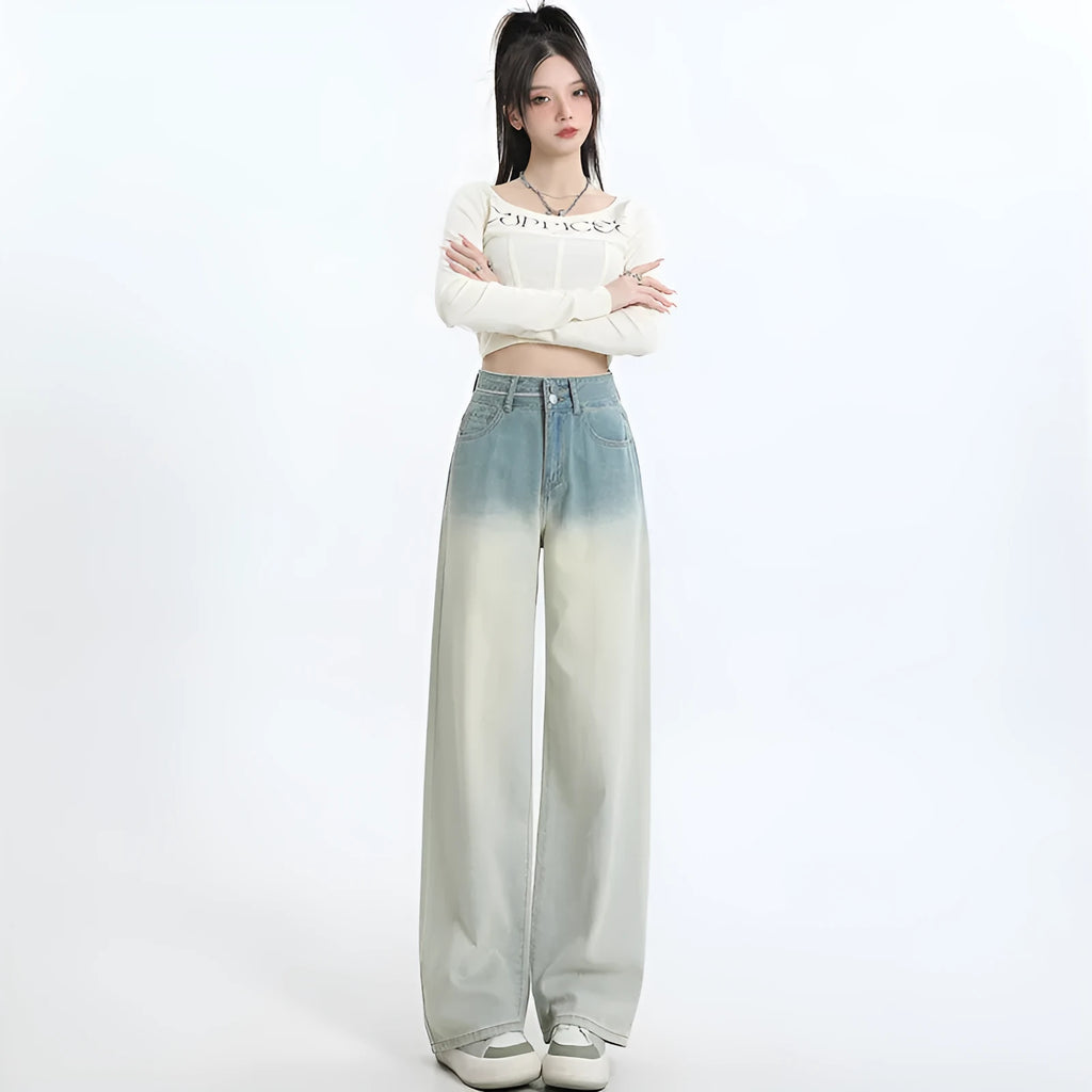 Gradient blue women's straight-leg denim trousers showing colour variation from light to dark blue tones