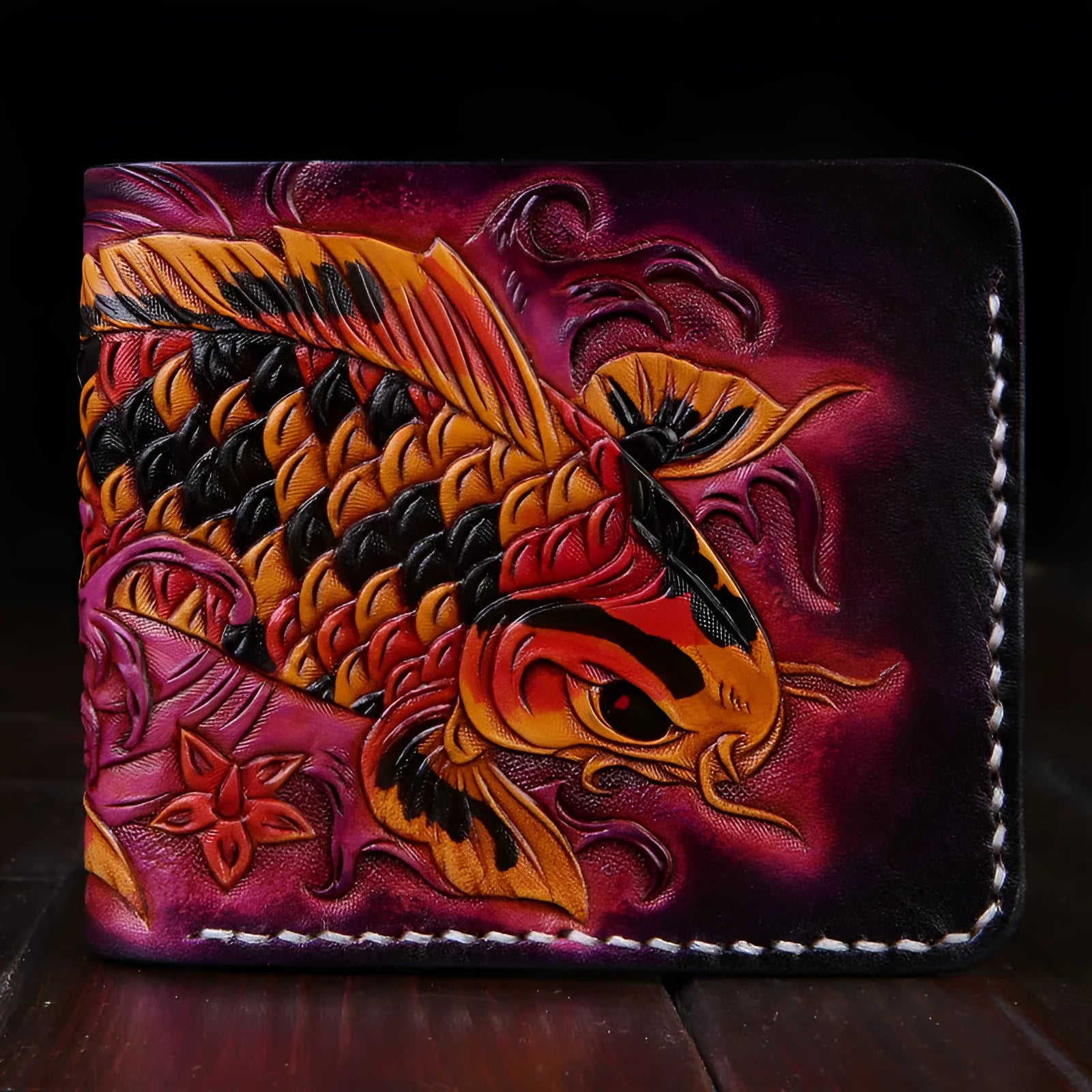Men's red cow leather short wallet with manual carving and open style, shown next to a blue and gold version.