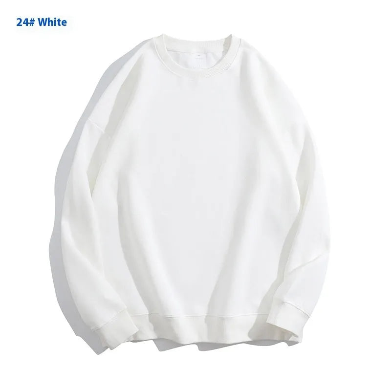 Women's loose fit cotton off shoulder sweater in a solid colour on a hanger.