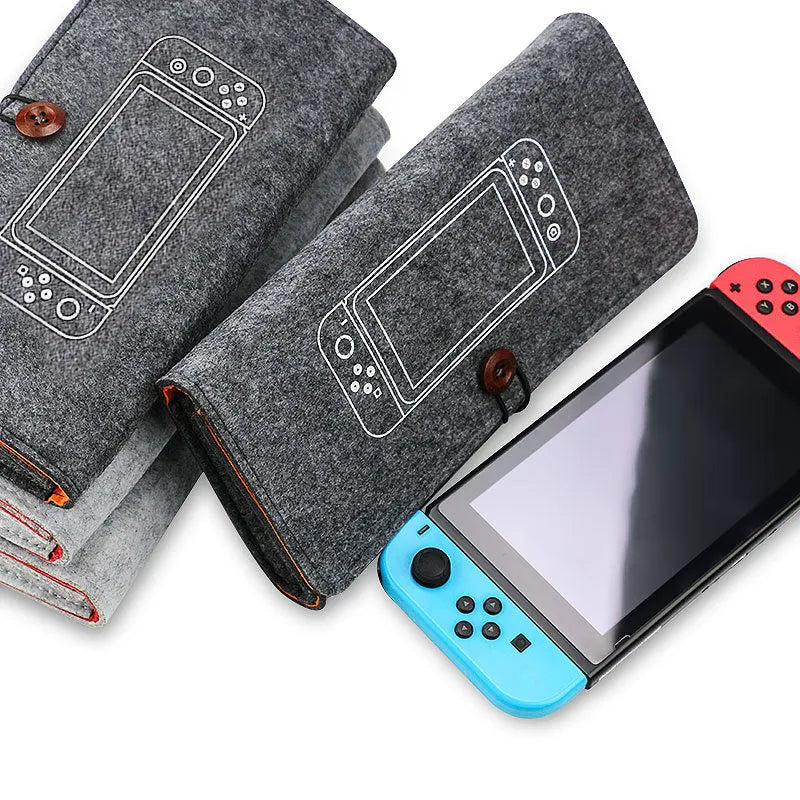 Black felt Nintendo Switch pouch with game card slots and double storage compartments