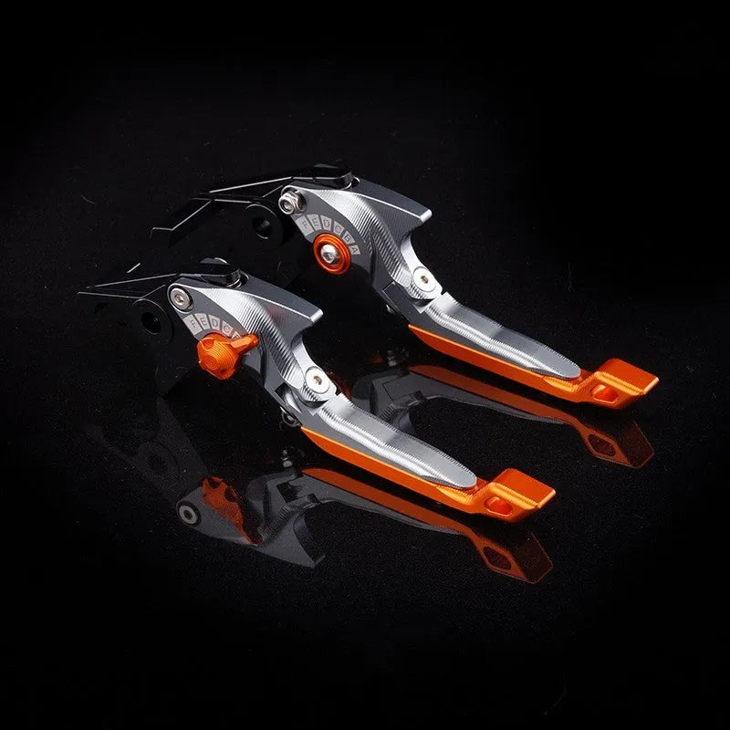 Pair of anodised metal motorcycle horn handle clutch levers with six-speed adjustable length, shown in a selection of colour finishes