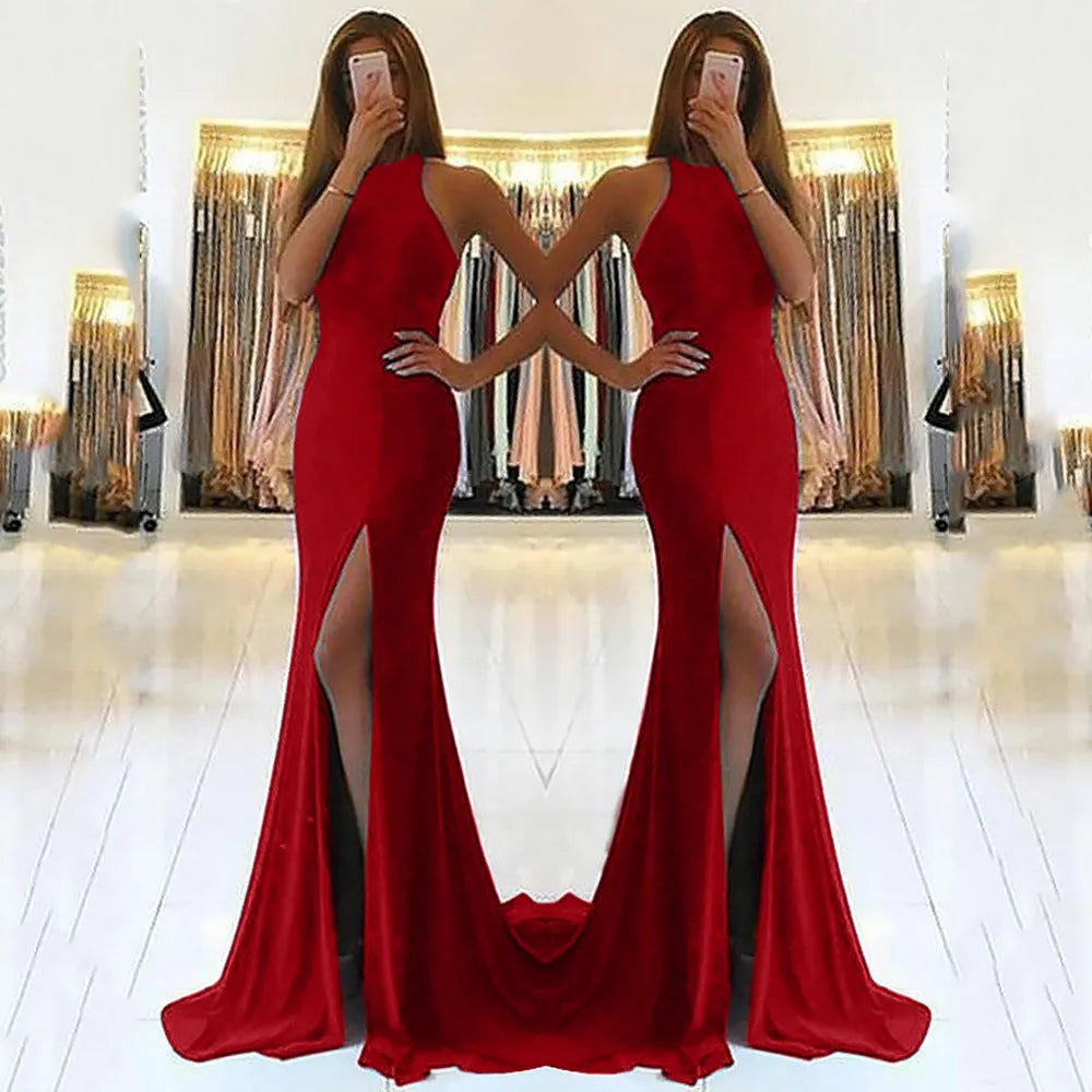 Red long evening dress with hollow design detail, large swing skirt, and high waist.