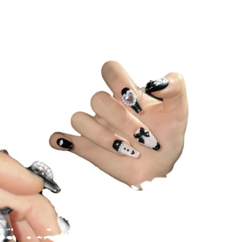 Black peach heart hand-painted false nails with cat's eye effect in four size options