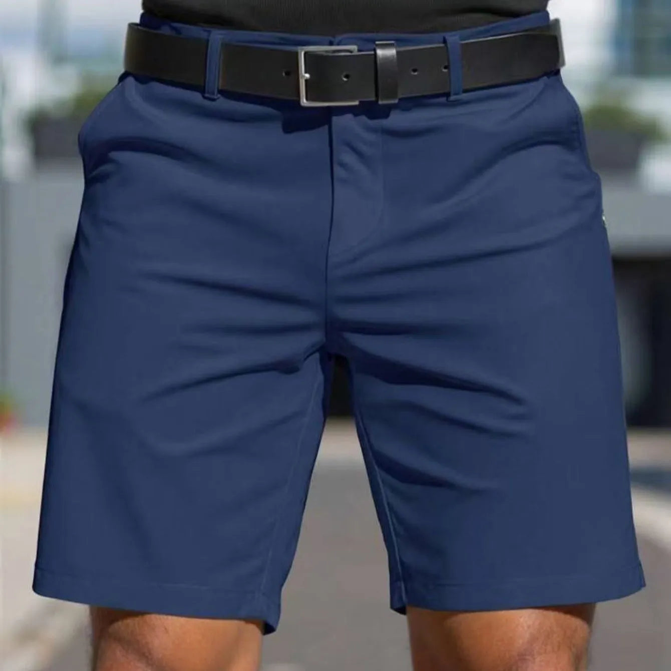 Men's solid colour straight-leg polyester shorts with micro elasticity, shown in apricot.
