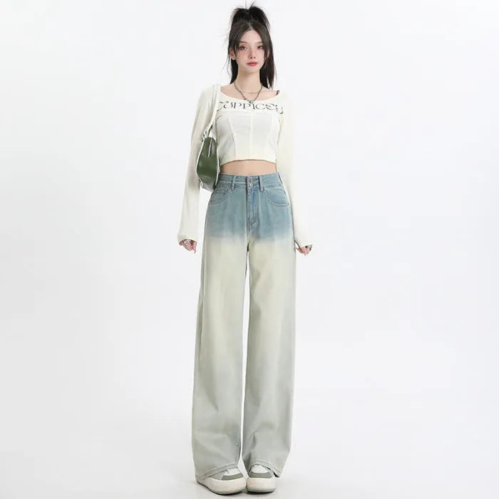 Gradient blue women's straight-leg denim trousers showing colour variation from light to dark blue tones