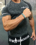 Men's short sleeve polyester workout top in blue, size M to 3XL, for gym training
