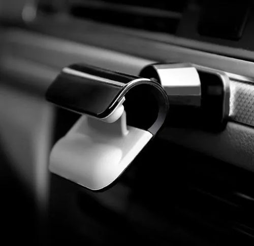 Black universal adhesive car phone holder showing 360-degree rotation mechanism for 4-7 inch mobile phones