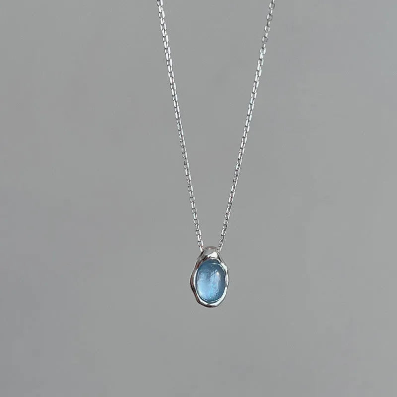 Navy blue water drop geometric pendant on adjustable copper chain with platinum colour finish