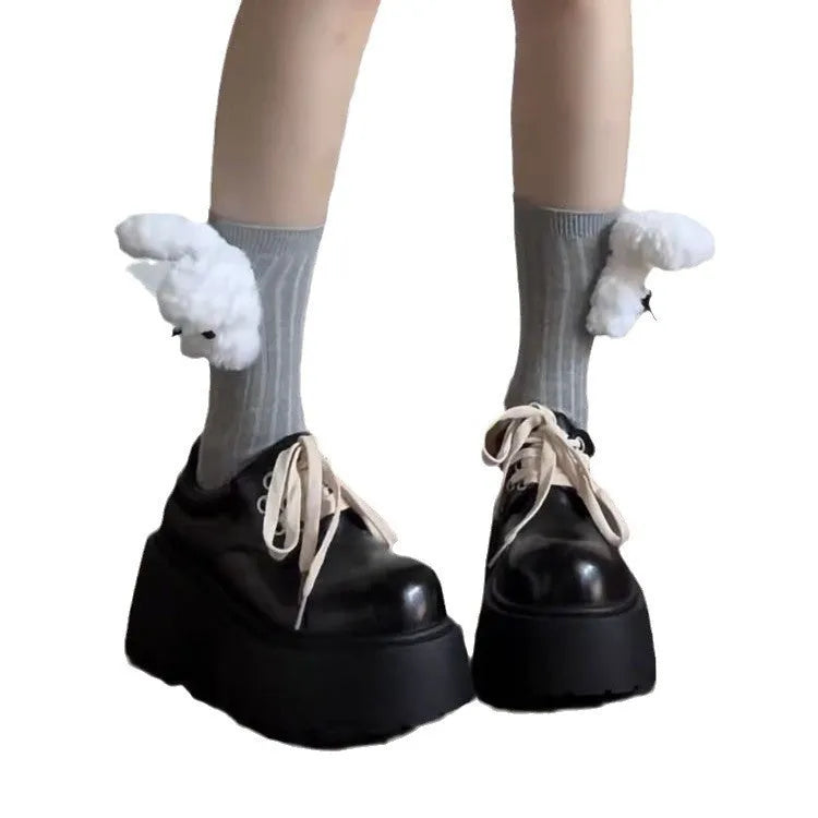Women's matte black lace-up high heel shoes with a thick rubber sole and round toe.