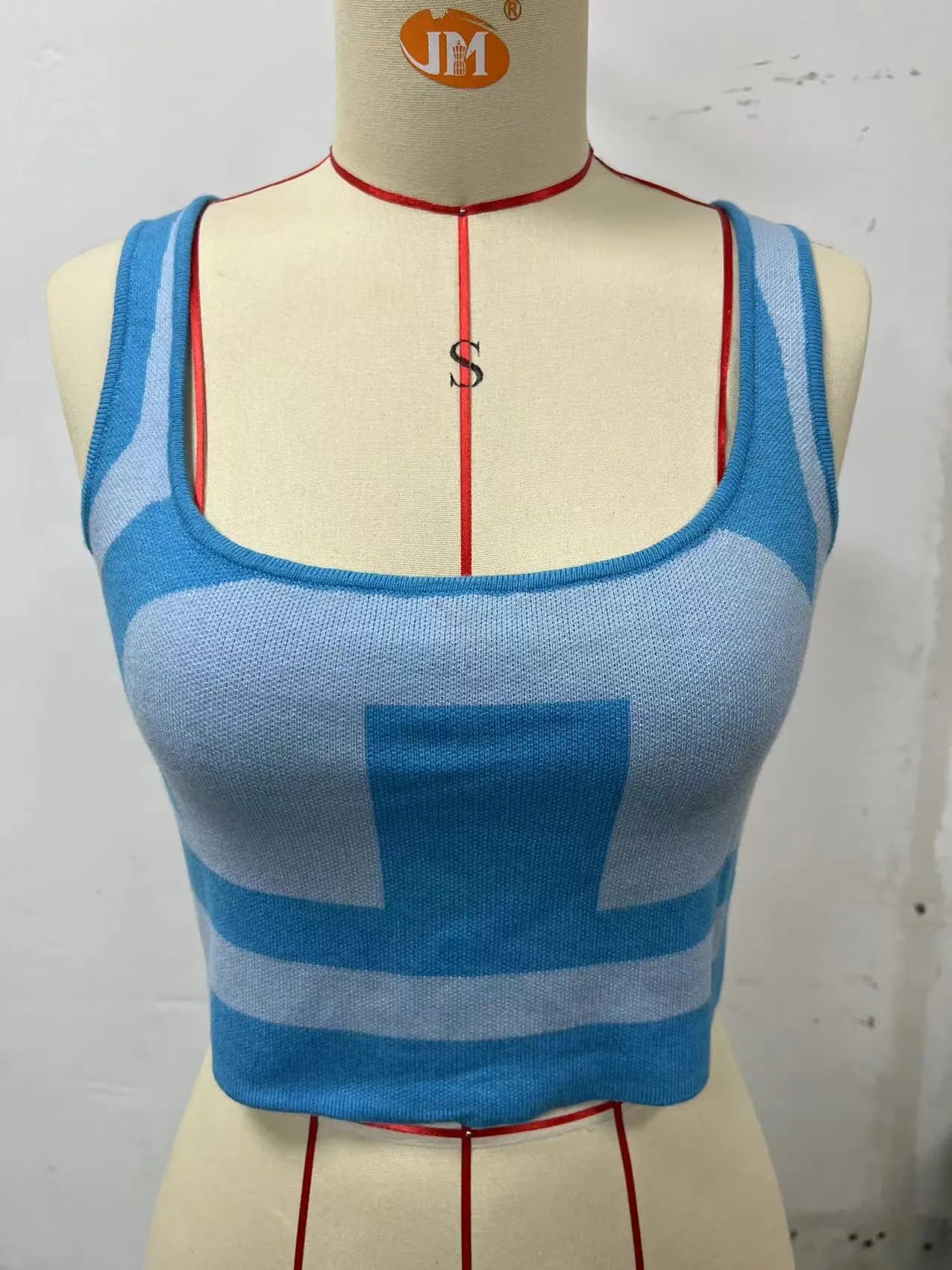 Women's U-neck contrast colour camisole with exposed navel styling in Core-spun polyester fabric