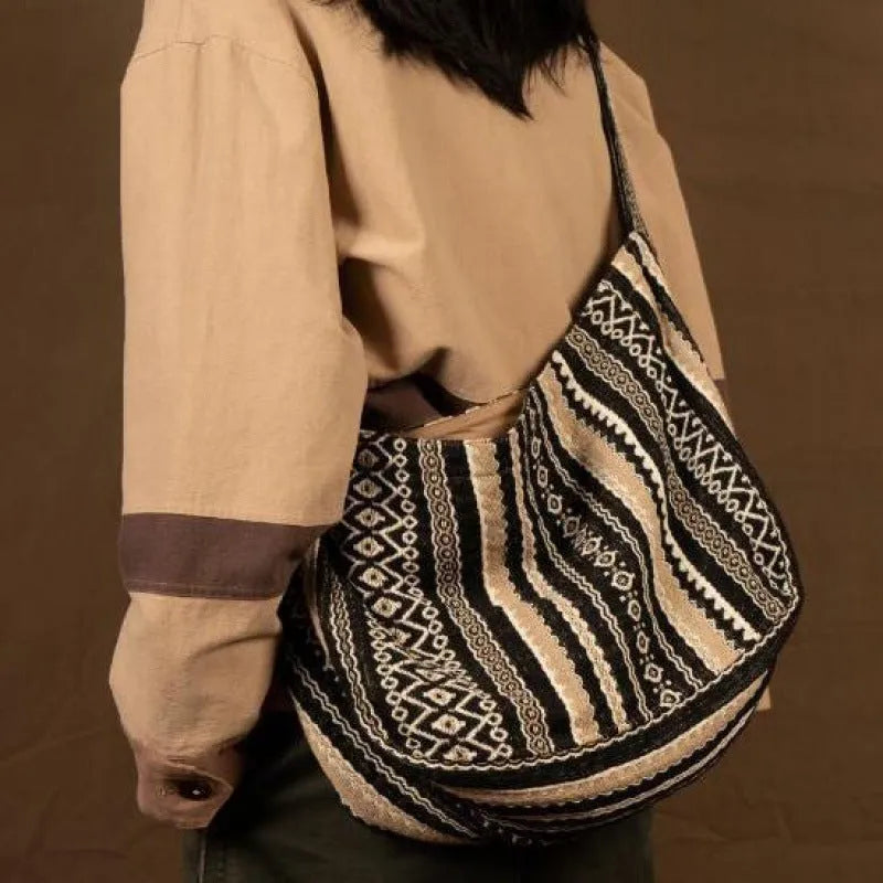 Retro striped corduroy messenger bag with adjustable plaid strap and zipper closure