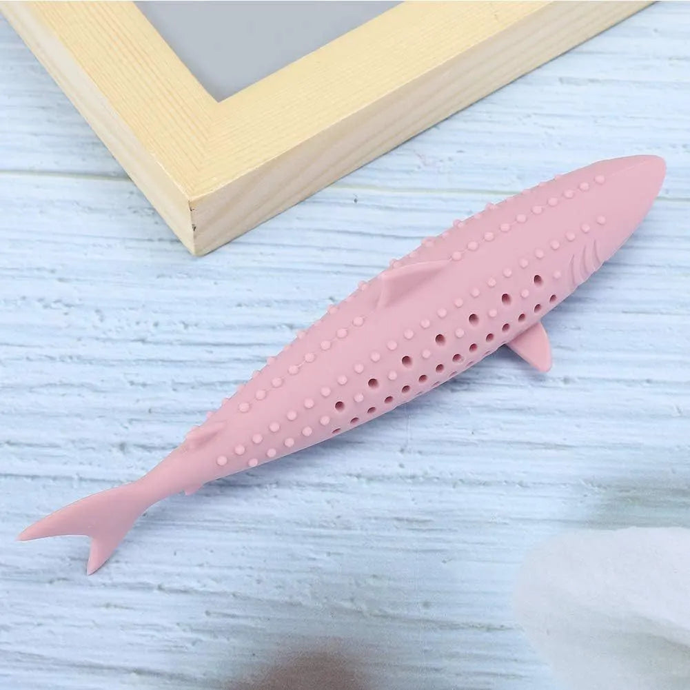 Silicone fish-shaped cat chew toy with breathable holes in green, pink, or purple colours