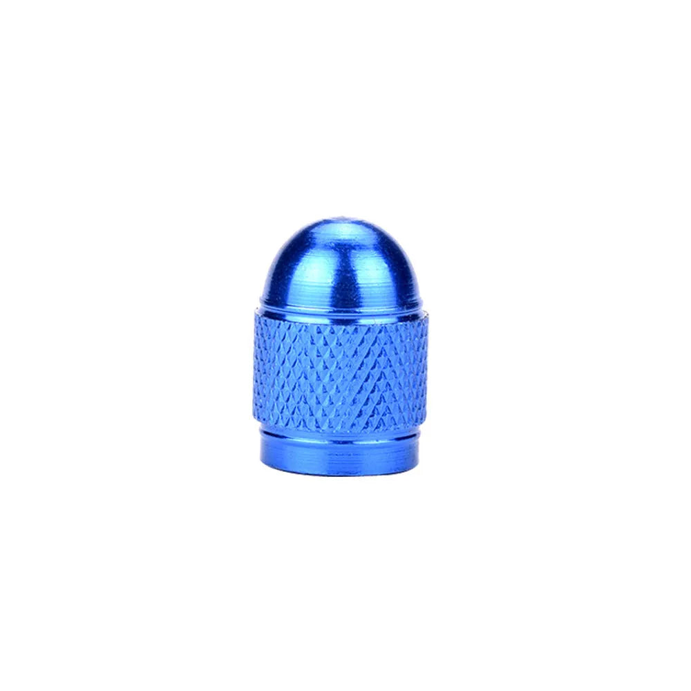 Aluminium alloy mountain bike tyre valve cap in gold, red, silver, blue, and black colours.