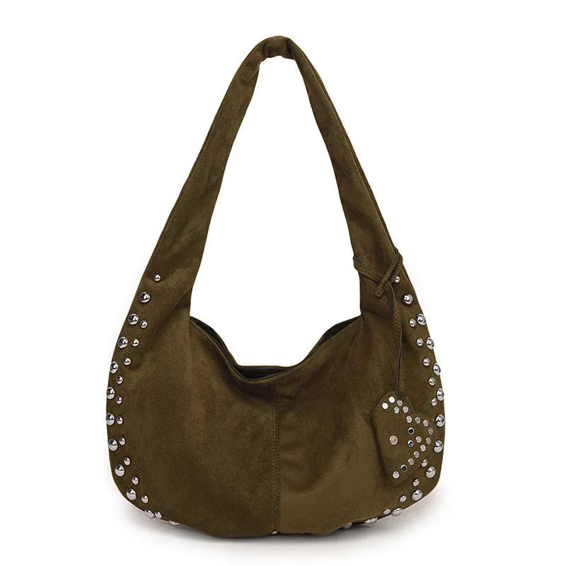 Women's soft plush tote handbag in retro styling with strapless underarm design