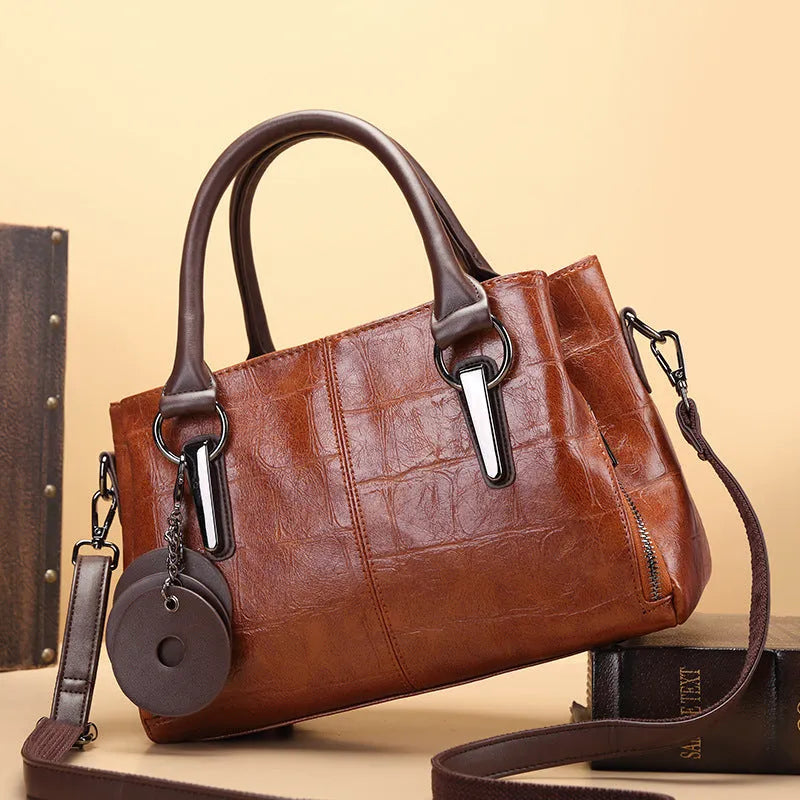 Large capacity shoulder bag in vintage brown with horizontal square design and multiple internal compartments