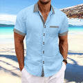 Man wearing a slim fit striped casual shirt with double button short sleeves in pure cotton.