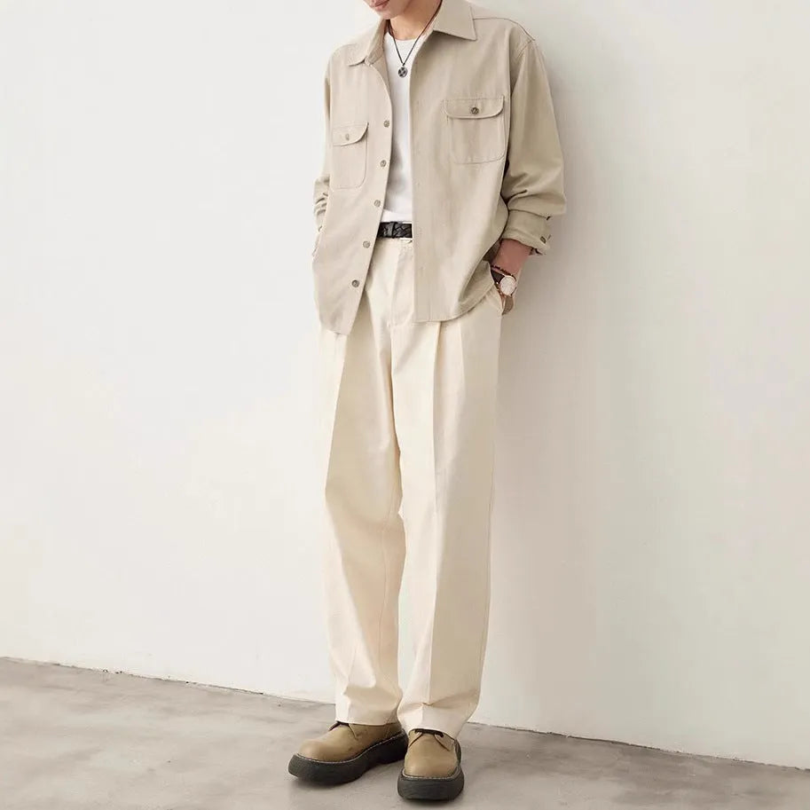 Men's light sand rice coloured long sleeve shirt with a lapel collar, laid flat to show front design.