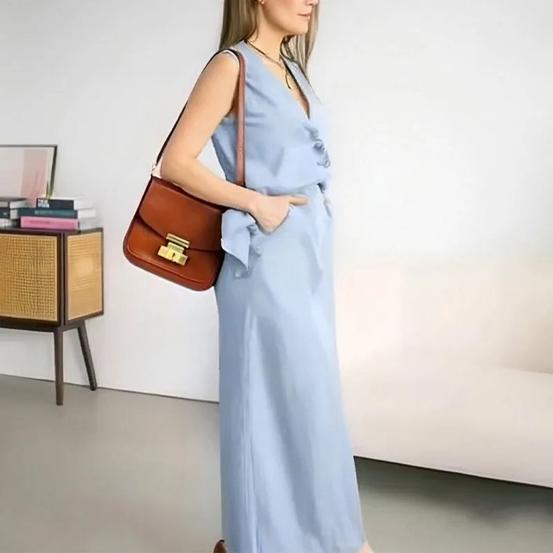 Women's polyester two-piece set with sleeveless vest top and long skirt in blue colour