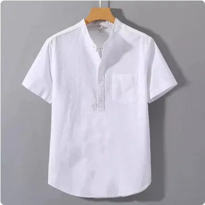Man wearing a beige slub linen casual shirt with a stand collar and short sleeves, loose fit.