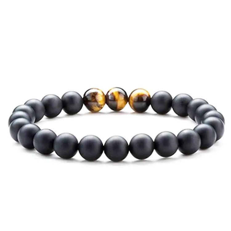 Pair of matte black agate bead bracelets with geometric design for couples.