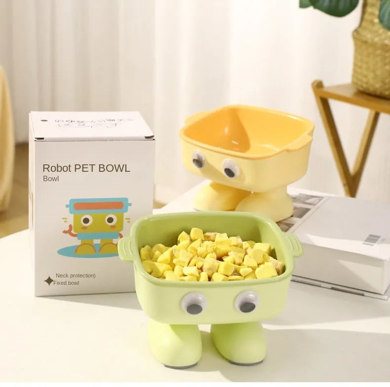Green robot-shaped elevated cat bowl with tilted dish and non-slip base