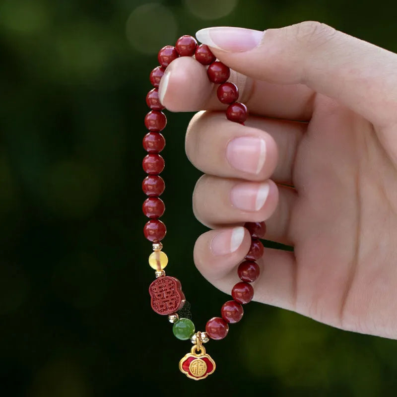 Cinnabar fu character bracelet with emperor sandstone beads in 6mm and 8mm size options.