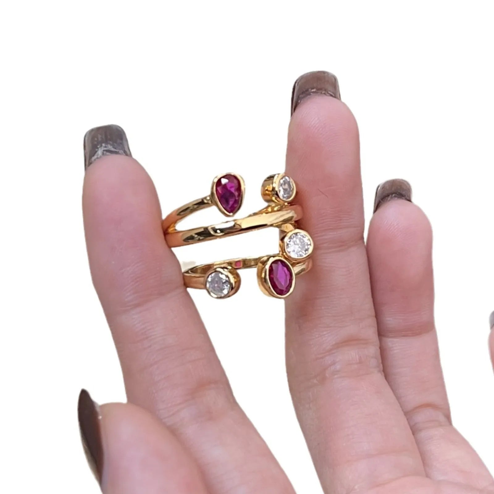 Irregular cross geometric ring with double-headed diamonds and two-tone colour finish