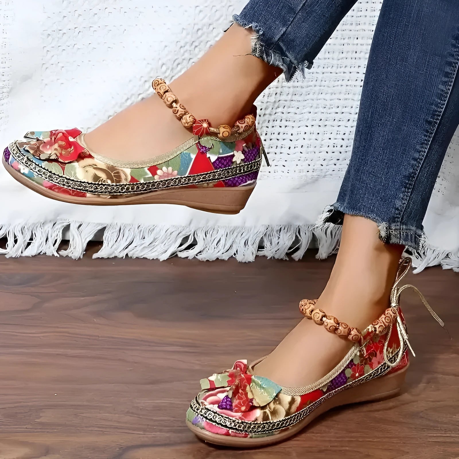 Women's ethnic platform sandals with elastic band closure in black colour showing cloth upper and round toe design