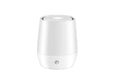 White USB aroma diffuser humidifier with flickering flame effect light on a wooden surface.