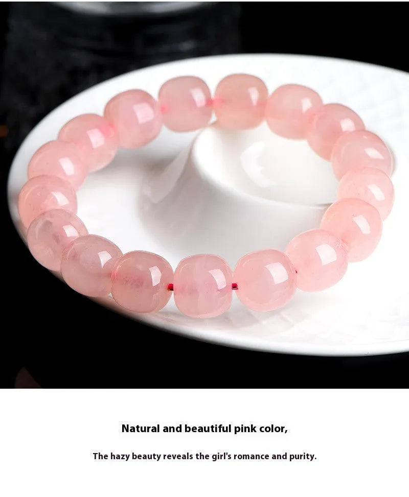 Pink barrel-shaped crystal bead bracelet with polished finish and original geometry design
