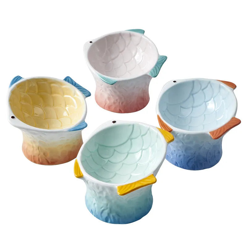Blue fish-shaped ceramic cat bowl with 15-degree tilt angle and elevated design