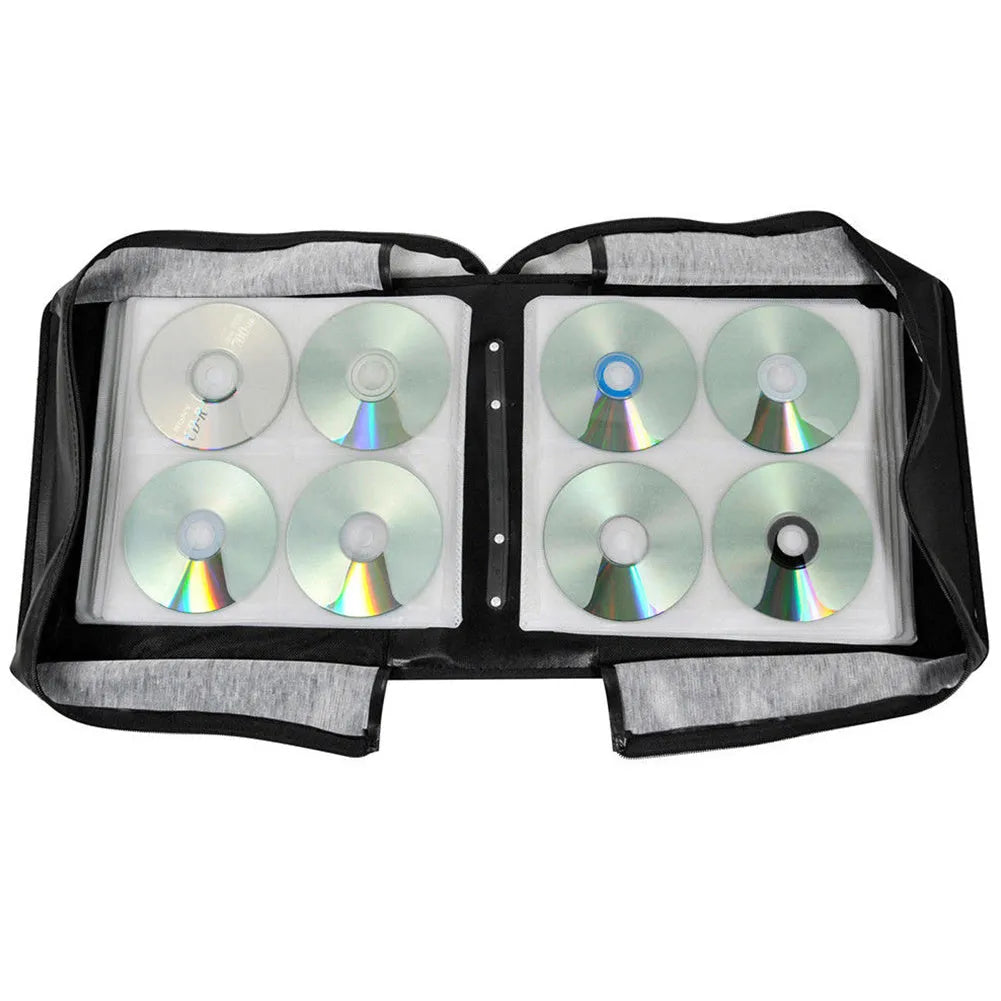 Black Oxford fabric CD DVD storage binder organiser with a hand strap and zipper, showing its capacity for hundreds of discs.